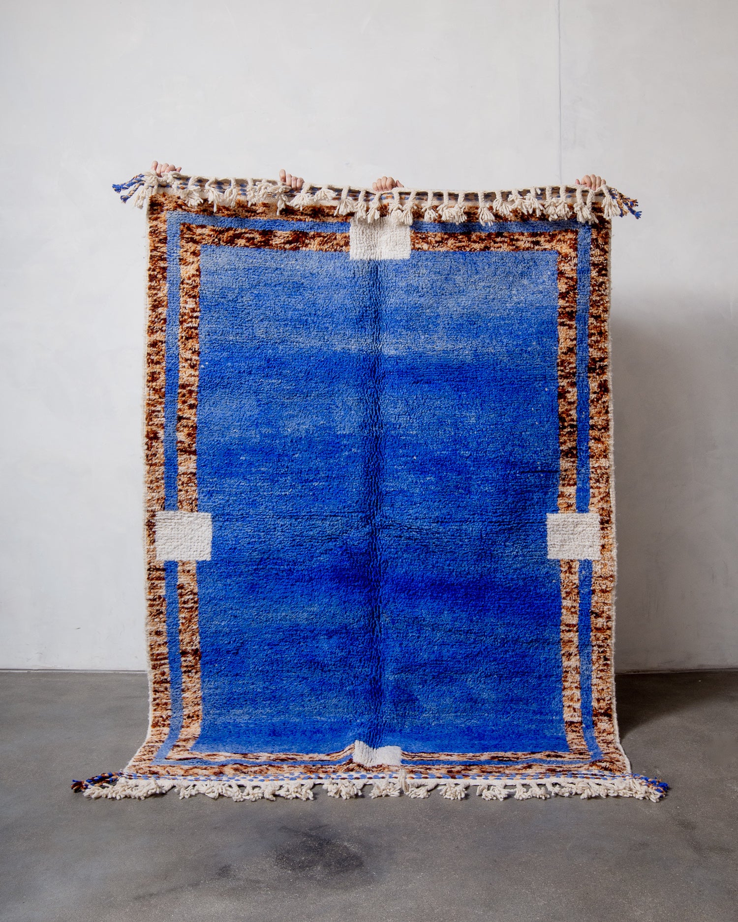 Modern, designer, handcrafted Berber rug from Morocco. Beniourain carpet with beautiful colours and patterns and fluffy wool texture.